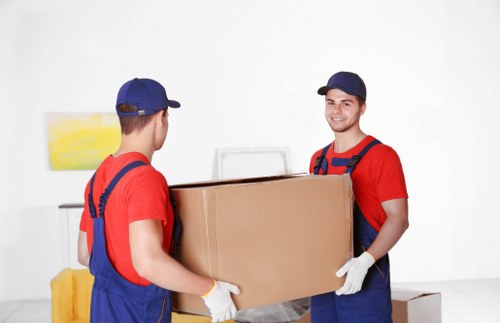 Removal van and moving team serving a Notting Hill residential street
