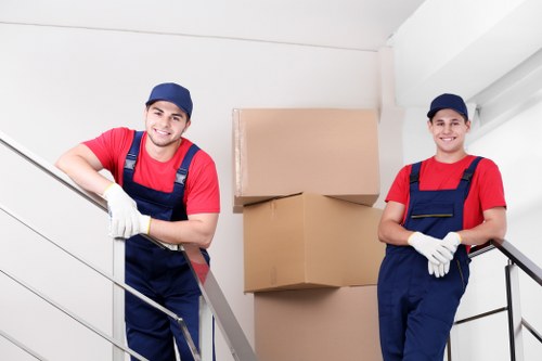 Removal team planning a move in a Notting Hill street setting