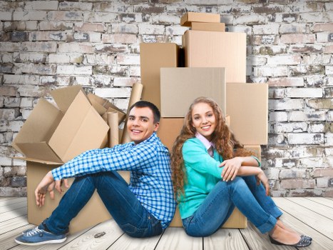 Local moving team handling belongings in a Notting Hill property with care