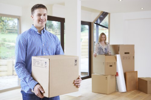 Removalists loading household furniture for a move in Notting Hill