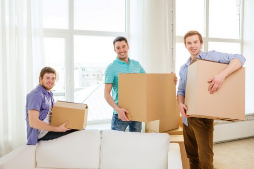 Packed boxes and furniture ready for a local move in Notting Hill