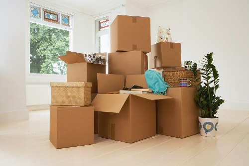 Movers handling flat access in a Notting Hill apartment building