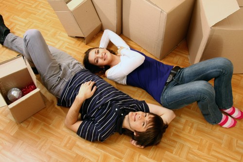 Boxes and wrapped belongings prepared for unloading at a new home