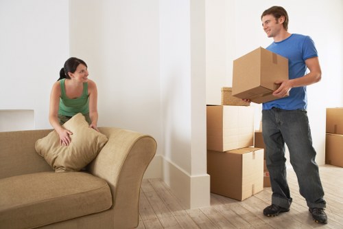 Careful loading of household furniture near a Notting Hill property